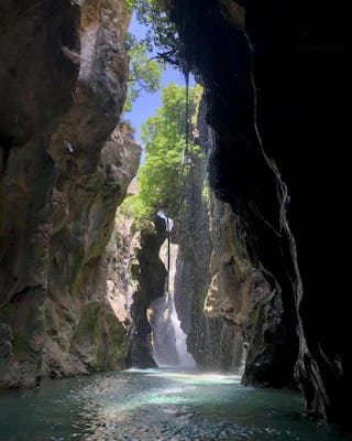 Explore Kourtaliotis Waterfall with YourGuide: A Diving Adventure