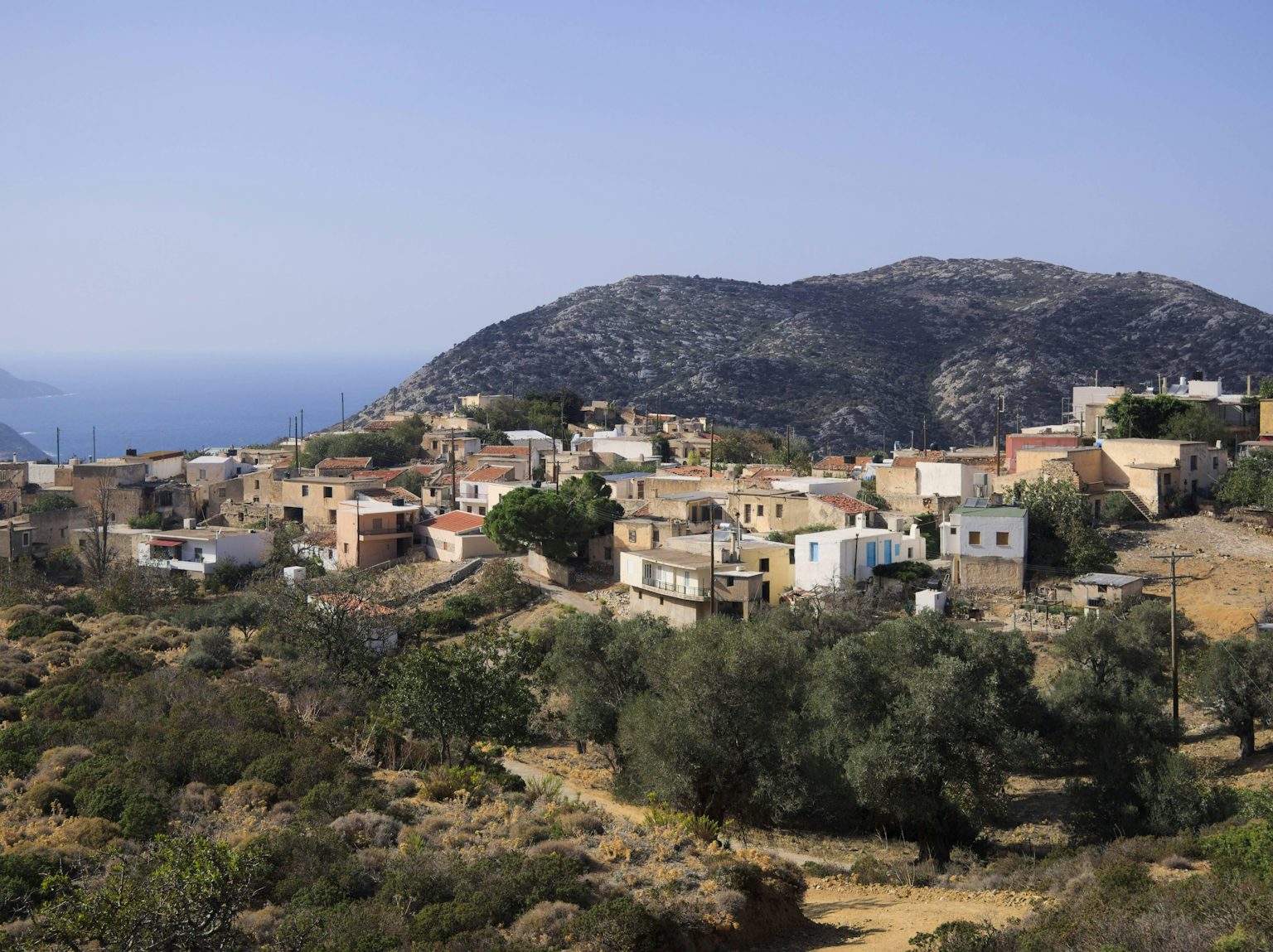 Achlada: Traditional Alleys and Endless Seaside Views